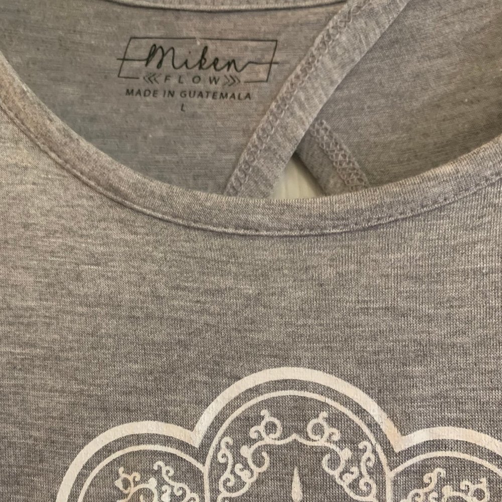 Miken FLOW Talk to the Hasma Open Back Tank Top